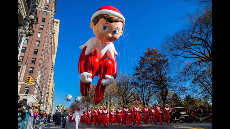 The Elf on a Shelf balloon floated by on a blue-sky day in 2012.
