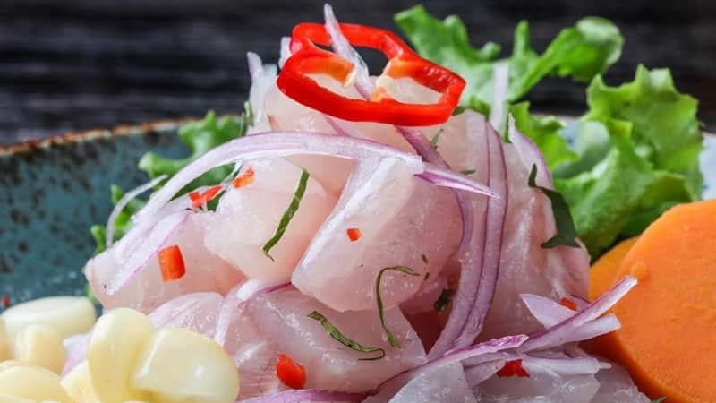Considered Peru's national dish by many, ceviche -- spelled cebiche in Peru -- is made up of marinaded fresh seafood, lime juice, chilies, red onion, sweet potato, cancha crunchy corn and cilantro. 