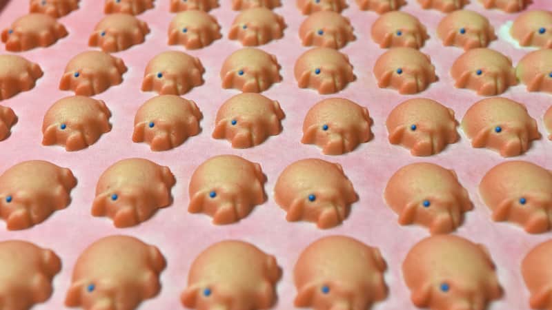 Fresh marzipan made in the shape of little pigges. 