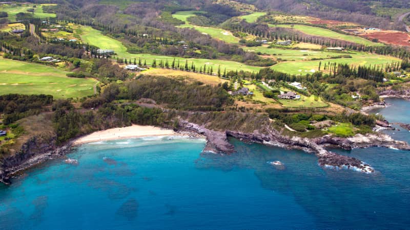 Molokai has breathtaking Hawaiian scenery and quiet accommodation.