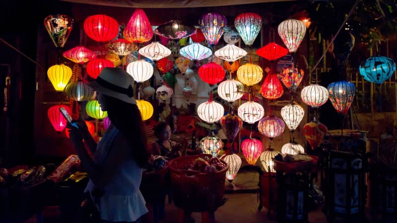The old town area of Hoi An, lit with glowing lanterns