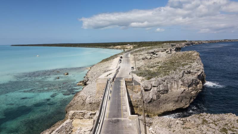 The Glass Window Bridge spans a sliver of land separating the deep blue Atlantic from the Bight of Eleuthera.