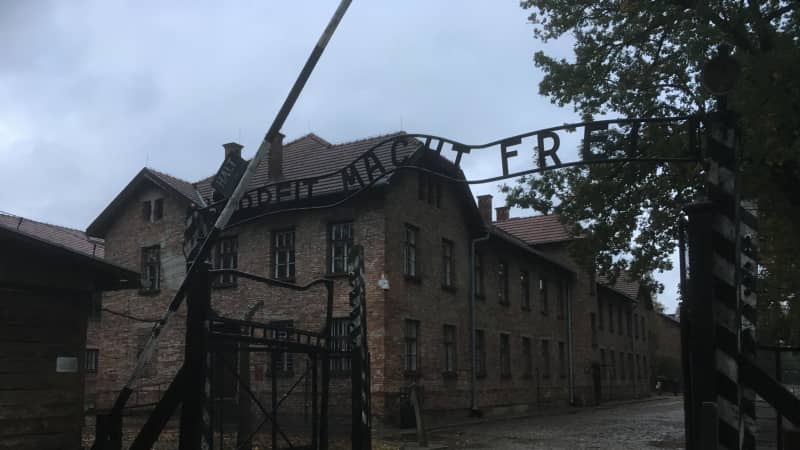 The entrance to the gate in the first Auschwitz camp reads Arbeit macht frei, "work sets you free."