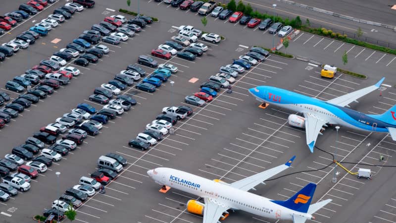 Boeing 737 MAX airplanes are stored on employee parking lots near Boeing Field, on June 27, 2019.
