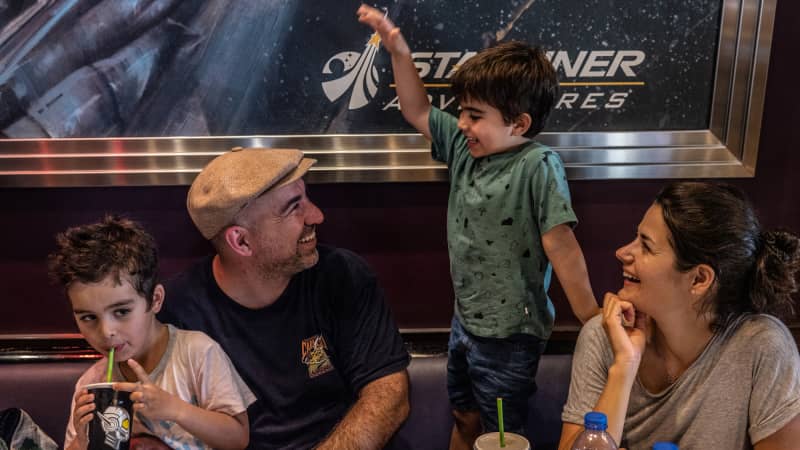 Shaun and Annamarie Devitt with their children Jameson and Felix inside a restaurant in Hong Kong Disneyland Resort.