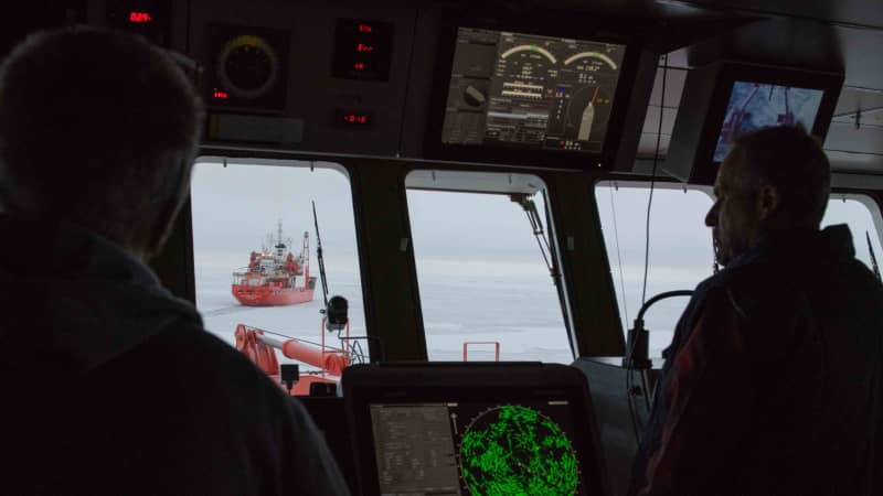 Captain Stefan Schwarze and Lutz Peine First officer on the bridge of Polarstern on October 2, 2019. Photographer Esther Horvath is onboard the Polarstern as part of the year-long MOSAiC expedition.