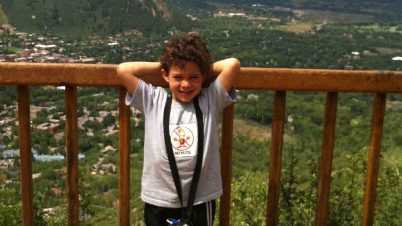 Josh Mandelbaum on vacation in Colorado. He was bullied by other children in the airport while flying home.