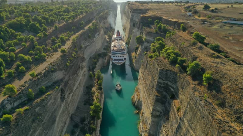 The Corinth Canal connects the Gulf of Corinth with the Saronic Gulf.