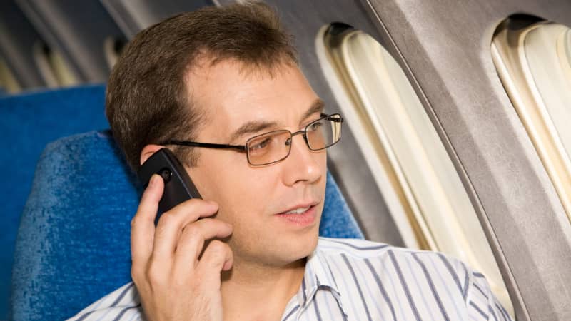 04 phones on planes talking on plane