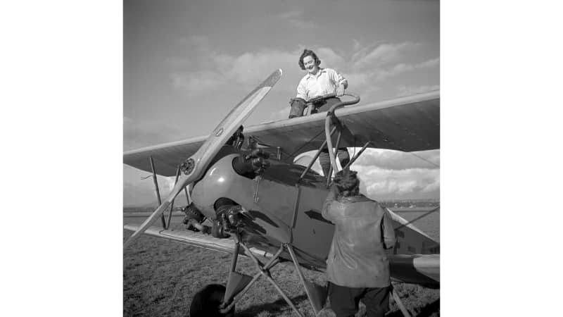 Gregory's curation brings alive stories of women aviators from history. Two members of the flying club with an aircraft from the 1930s are featured in this photo from the museum's archive.