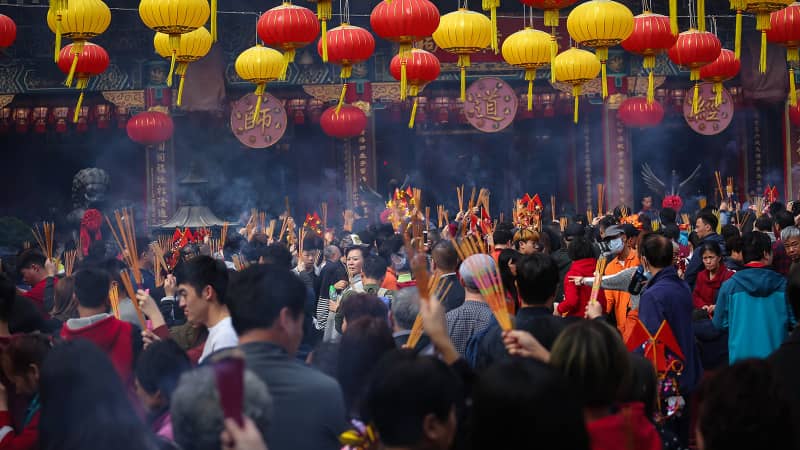 Praying for fortune at Wong Tai Sin Temple during Lunar New year