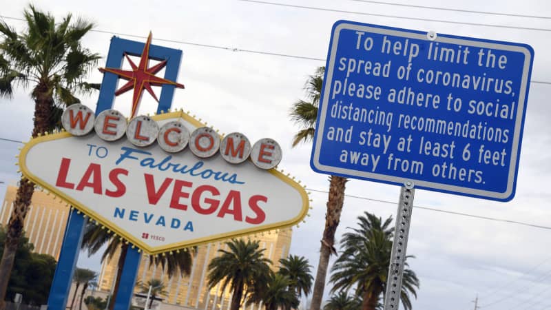 A message on a sign placed in front of the Welcome to Fabulous Las Vegas sign on March 22, 2020 in Las Vegas, Nevada