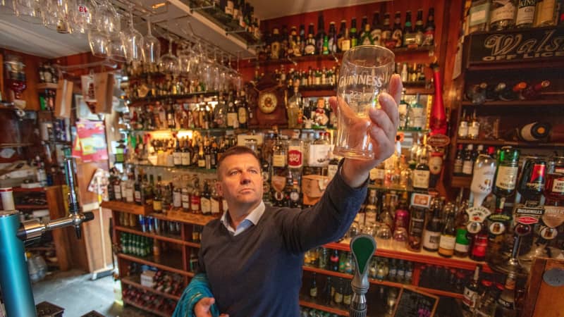 Publican Joe Sheridan poses for a photograph in his closed pub, Walsh's bar, in the Irish village of Dunmore in September 2020. 