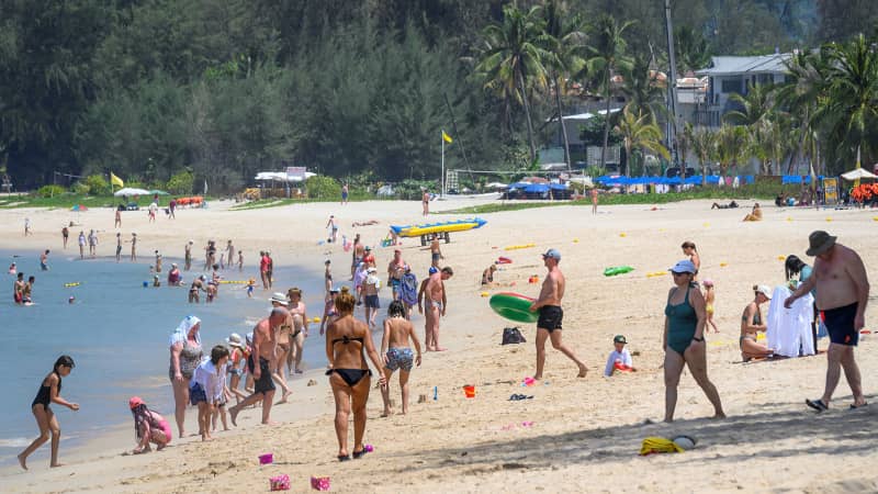 On March 20, 2020, international tourists continued to visit the beaches of Phuket, just days before the island locked down.