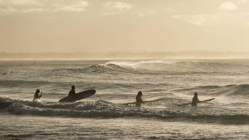 Byron Bay is known for its surfing scene and laidback ambiance.