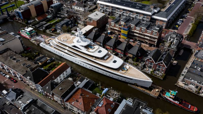 Feadship's new superyacht Project 817 is guilded through the canals of Holland while en route to the North Sea.