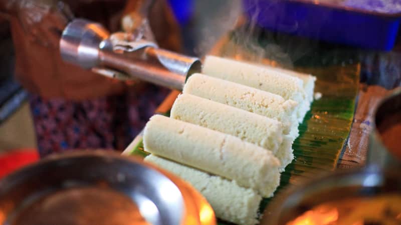 Puttu, a traditional South Indian dish, is among the foods served at Tamil Nadu's Meenakshi Temple.