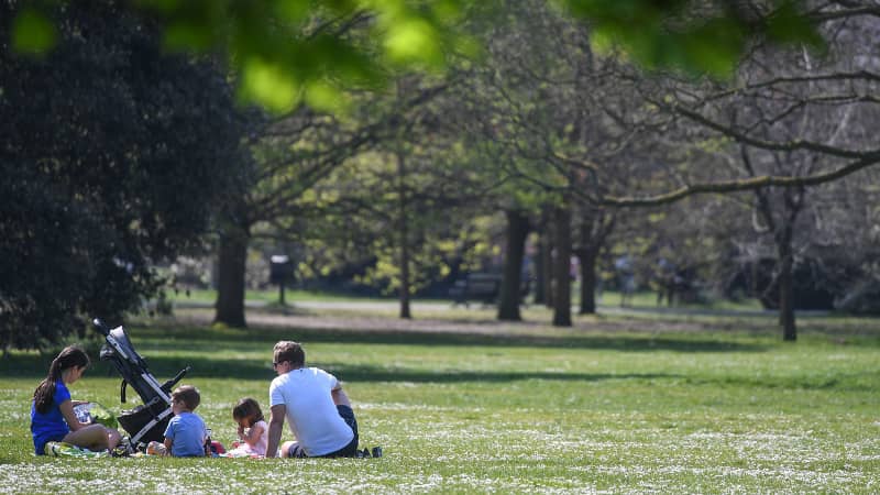 LONDON, ENGLAND - APRIL 11: A family are seen having a picnic in Greenwich Park on April 11, 2020 in London, England. Public Easter events have been cancelled across the country, with the government urging the public to respect lockdown measures by celebrating the holiday in their homes. Over 1.7 million people across the world have been infected with the COVID-19 coronavirus, with over 8,000 fatalities recorded in the United Kingdom. (Photo by Peter Summers/Getty Images)