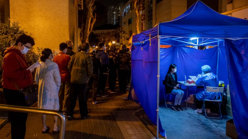 Hong Kong residents wait in line for Covid-19 tests on January 31, 2021. 