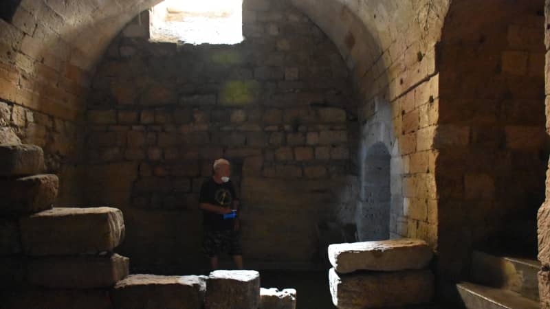 Historian Nello di Gregorio in one of the old city's underground chambers.