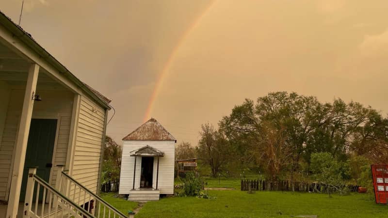 After the storm, a rainbow appeared Monday over the area.