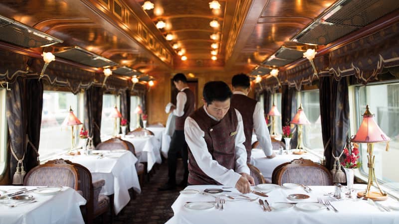 Passengers of the Belmond Eastern and Oriental Express are treated to fine-dining experiences. 