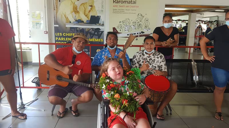Mathias was greeted with flowers and music upon arriving on Raiatea. 