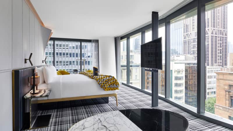 The W Melbourne's guest rooms boast deep-soaking tubs and sweeping views over the city or Melbourne's Yarra River.