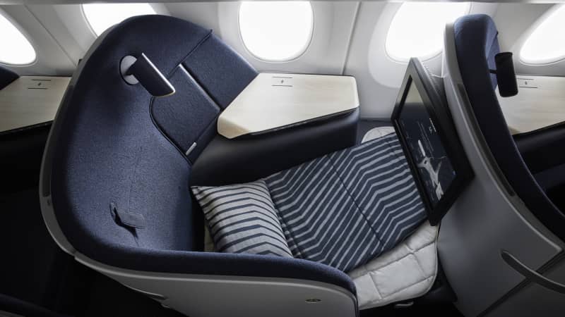 The seats are equipped with padded panels and a mattress to make a bed.
