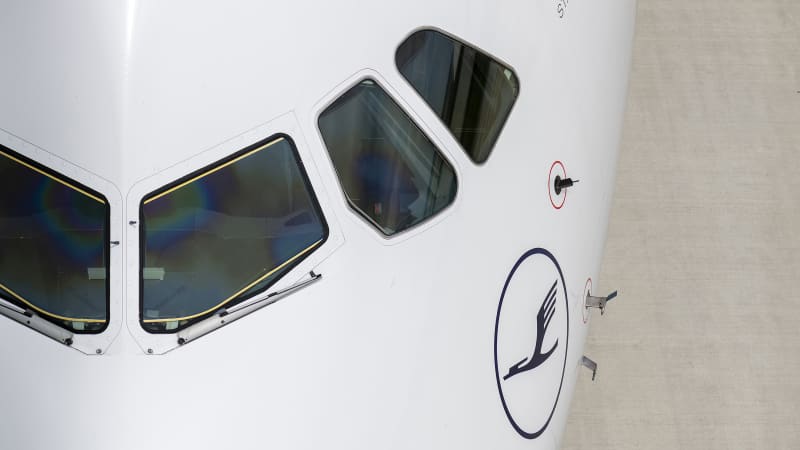 Changing a lens above a million-dollar plane has its stresses.