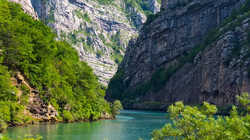 The Sarajevo-Mostar route takes you through canyons carved by the emerald Neretva river.