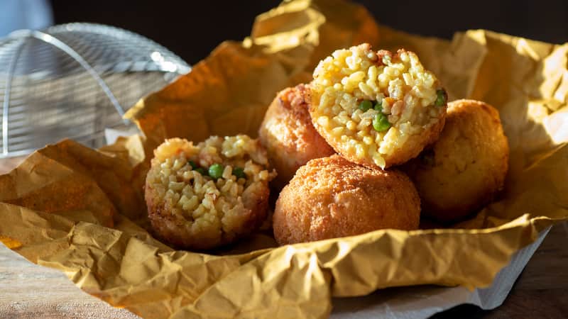 These breaded fried rice balls are yet another delicious dish from Sicily.