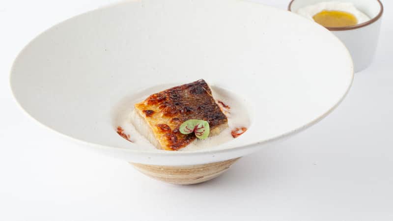 Mora's one-sided crispy threadfin with savory soy milk. 