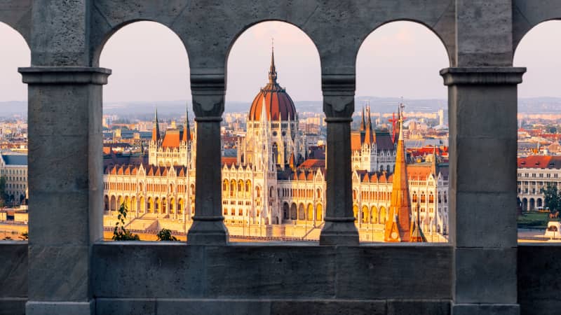 The Hungarian Parliament is seen through the arches of Fisherman's Bastion in Budapest. The CDC warns against travel to places where the Covid-19 risk is "unknown."