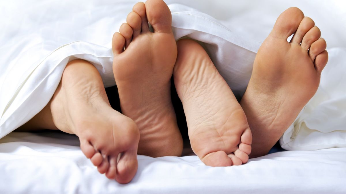 mature cum on sleeping feet photo