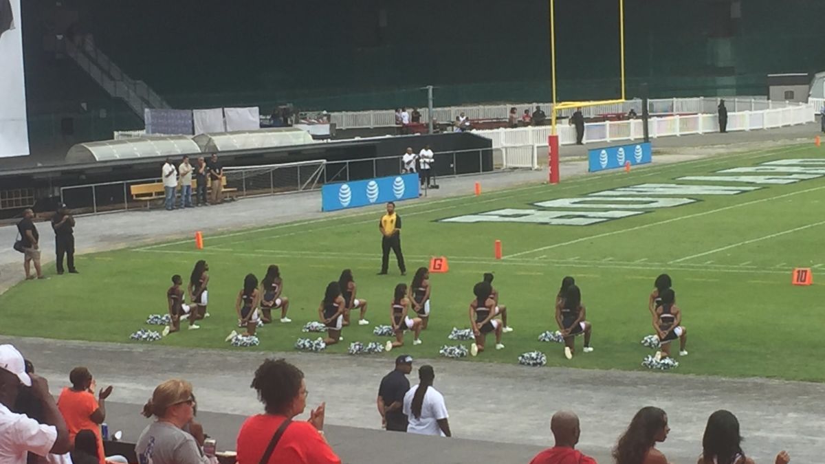 NFL cheerleader takes a knee during national anthem, News