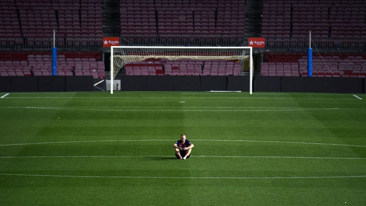 Andres Iniesta sits alone in empty stadium until 1am - CNN