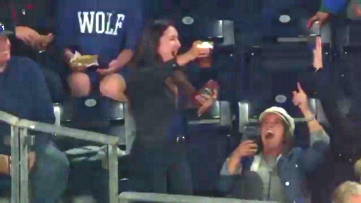 Dad With Baby Strapped To Chest Holding Beer Catches Foul Ball At