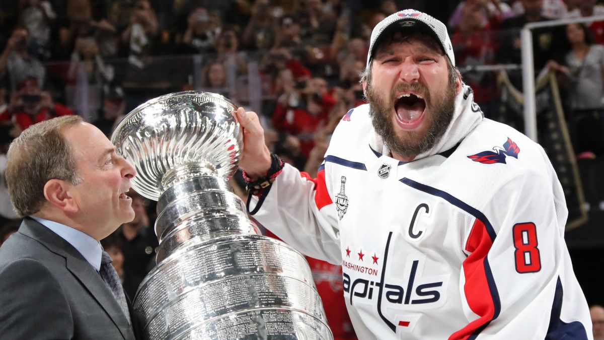 Alex Ovechkin receives mini trophies for winning Stanley Cup and