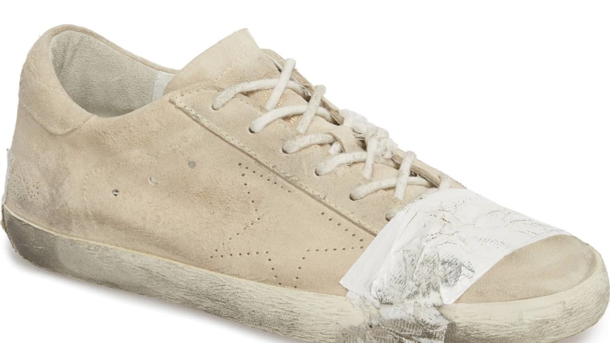 Grungy, taped-up $530 sneakers face 