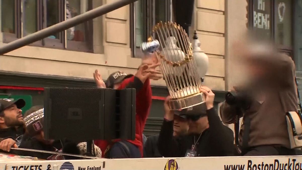 Here's the video of a Red Sox World Series trophy getting hit with a thrown  beer