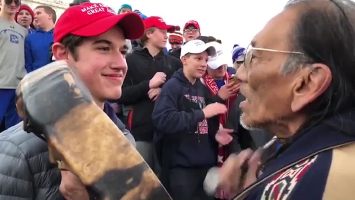 Image result for Maga hat teen stare down