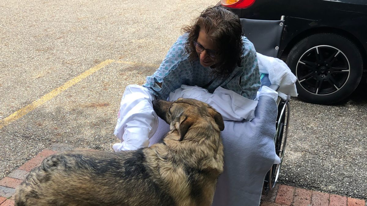 A woman lost her hands and legs to an infection from puppy kisses | CNN