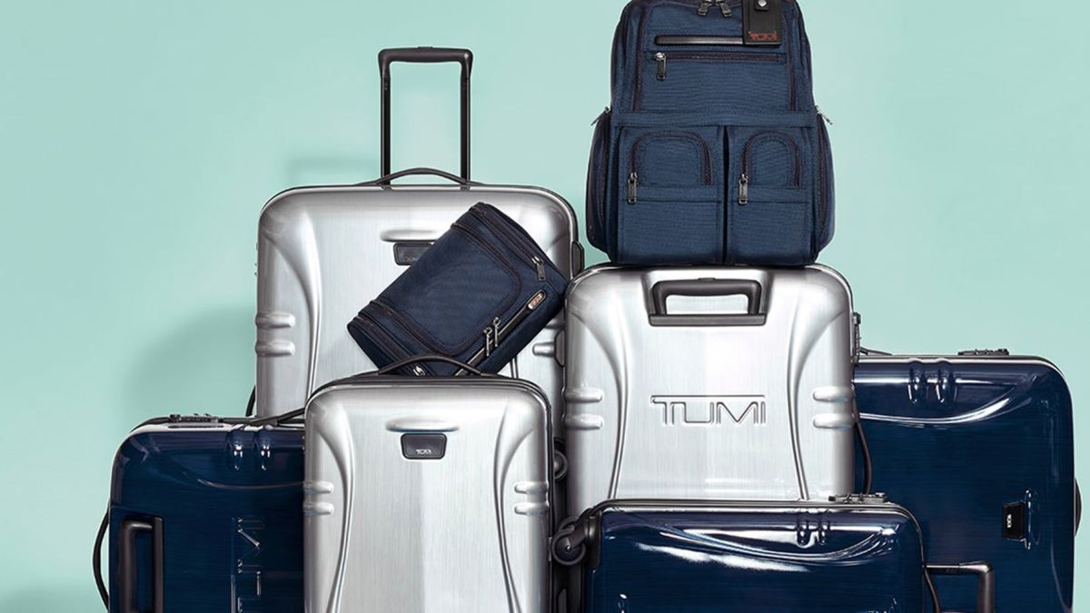 tumi leather carry on luggage