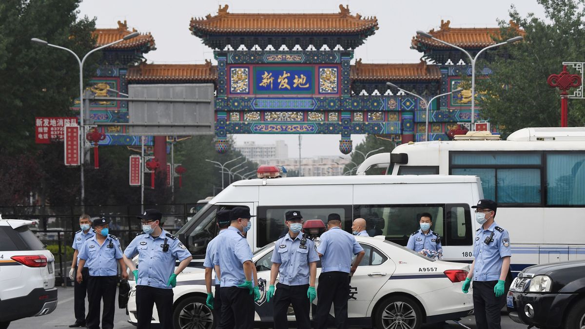China's new coronavirus outbreak sees Beijing adopt 'wartime ...