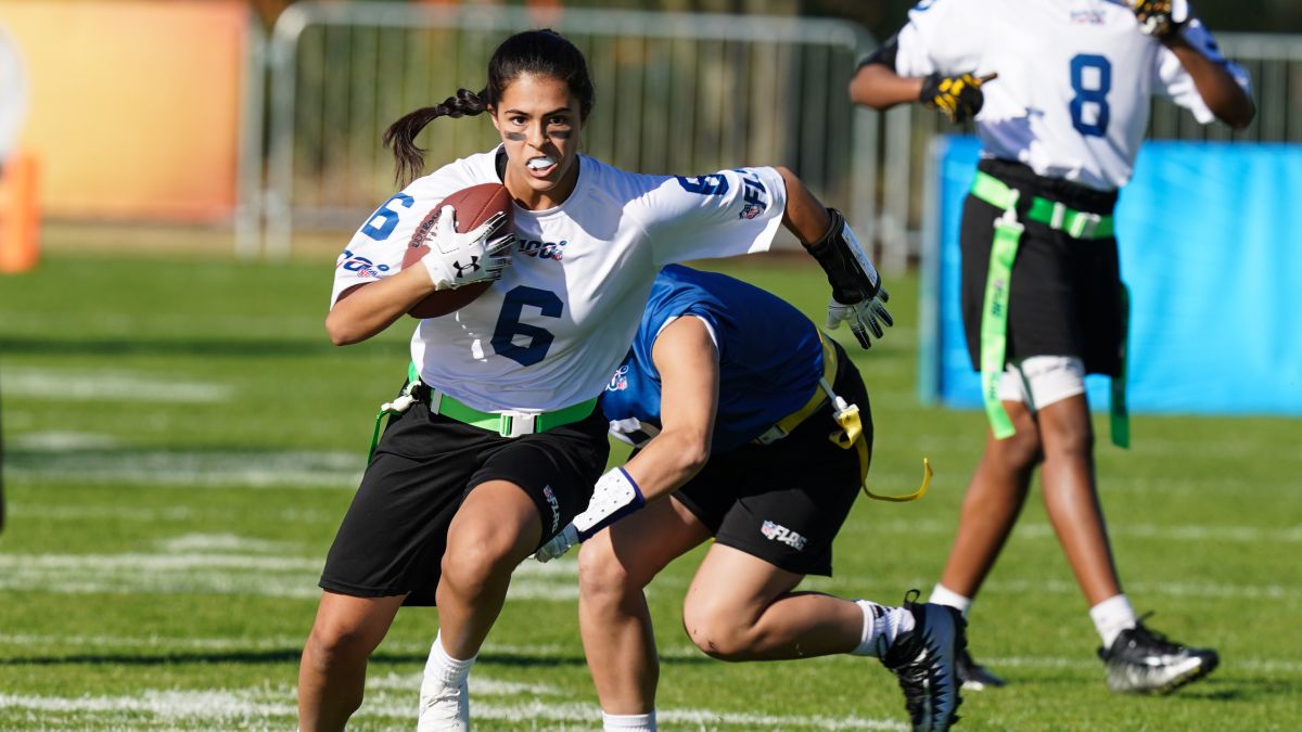 Woman becomes first flag football player with gear in Pro Football Hall of  Fame