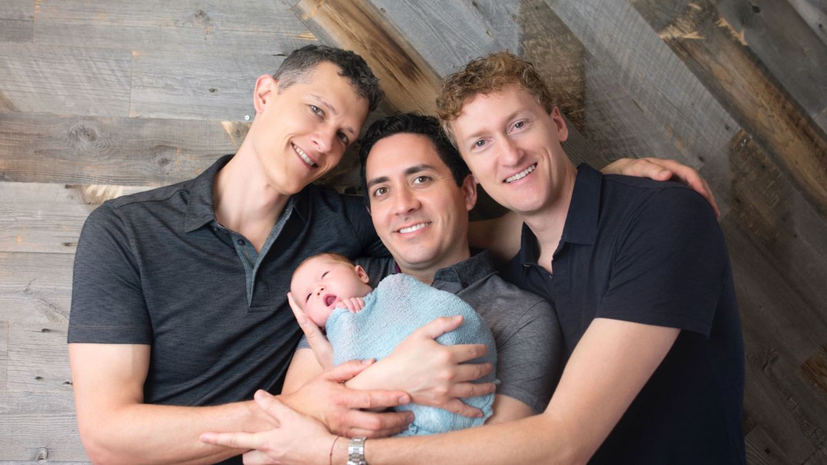 Three dads, a baby and the legal battle to get their names added to a birth certificate