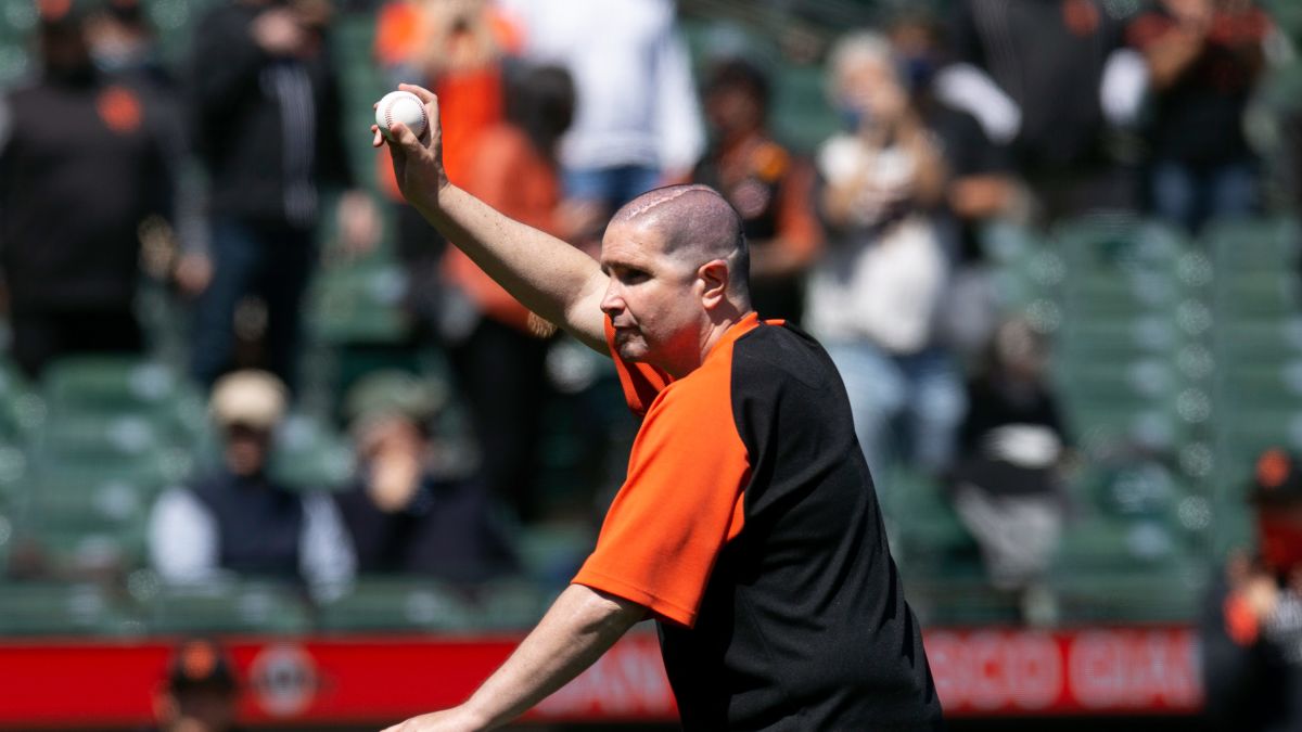 Giants fan throws ceremonial first pitch 10 years after a near-fatal attack