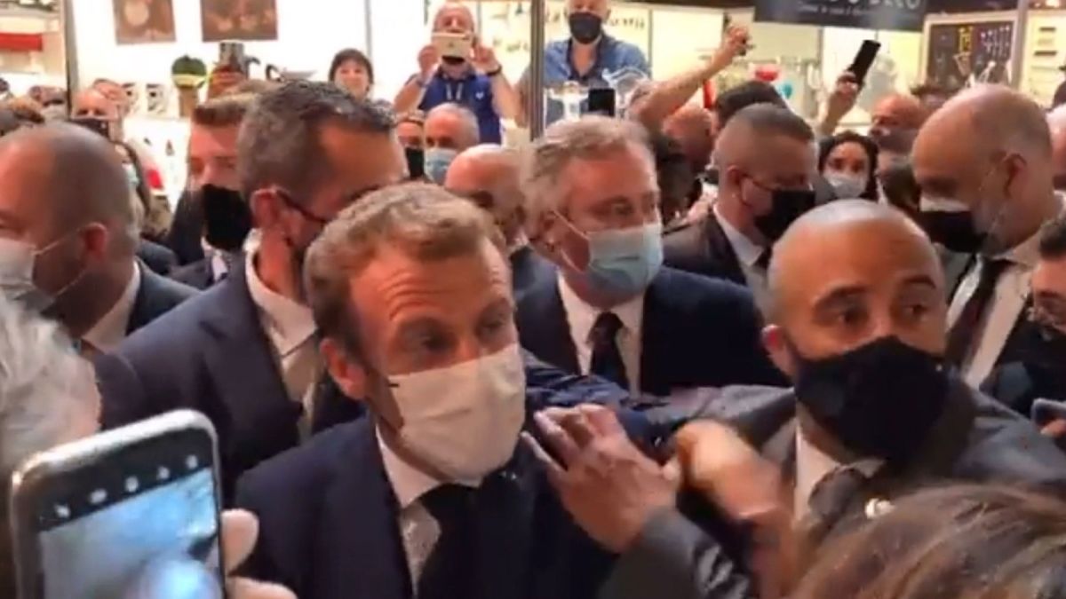 French President Emmanuel Macron hit by egg thrown from crowd in Lyon - CNN