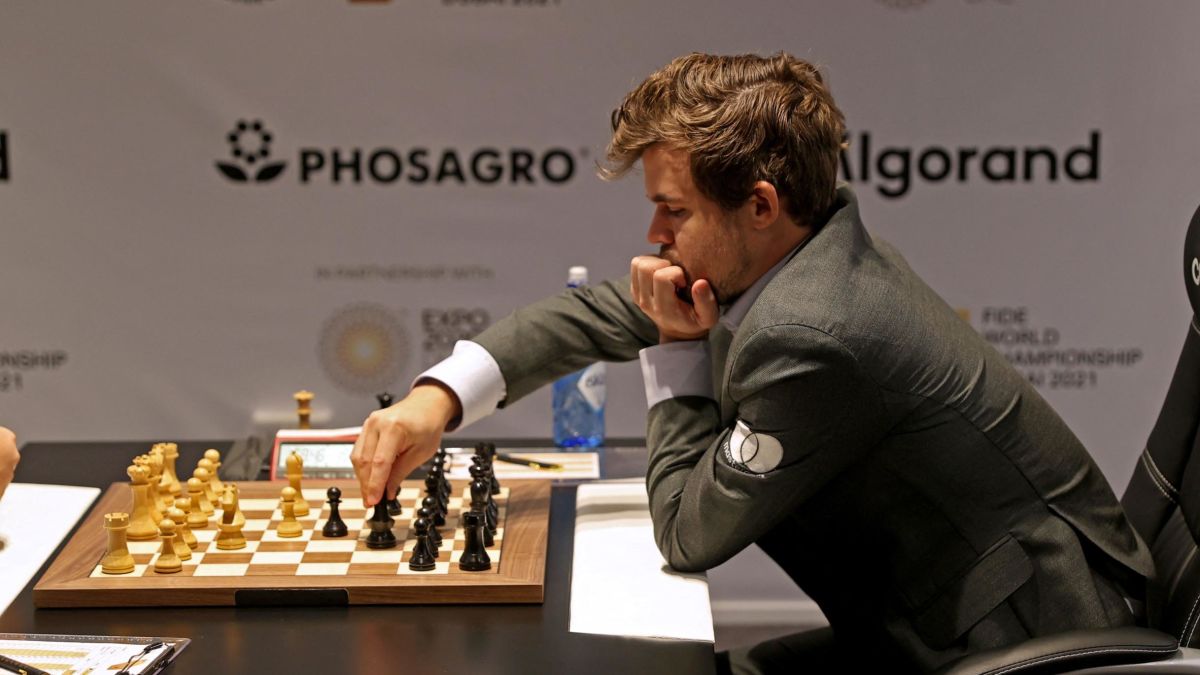 Boxer stuggling with chess game, Stock image